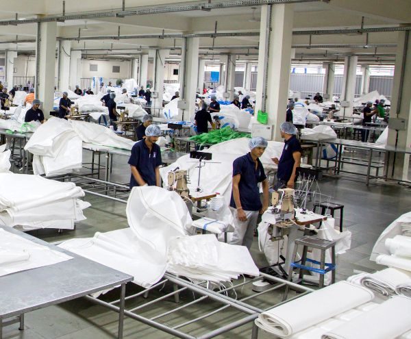Factory workers making our packaging